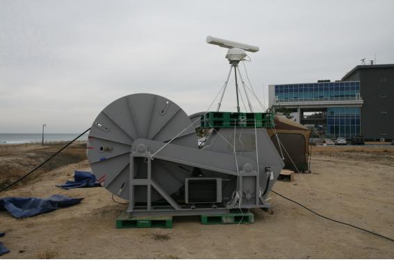  A ship surveillance radar and an AIS ship tracking system